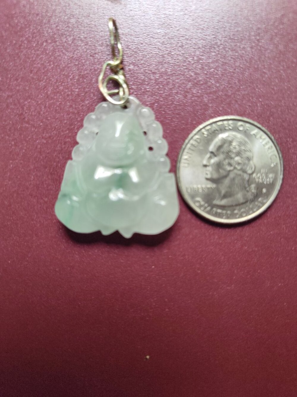 Beautiful A Grade Icy Jadeite Jade Buddha pendent with wire bail.